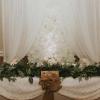 White and Ivory silk flowerwall with white drapes