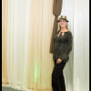 Photo booth backdrop with gold and ivory sheer draeps